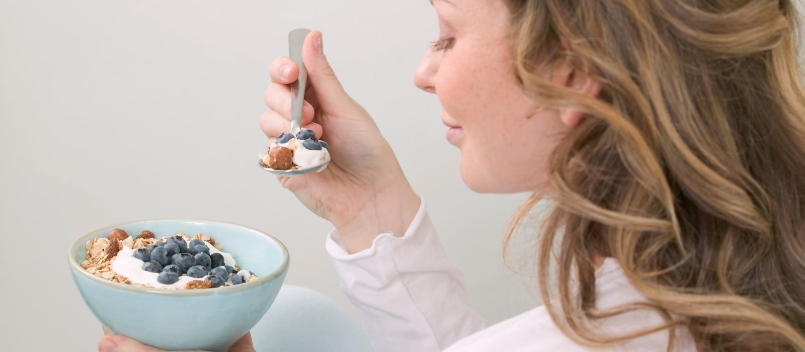 woman food colorful vegetables warm natural light