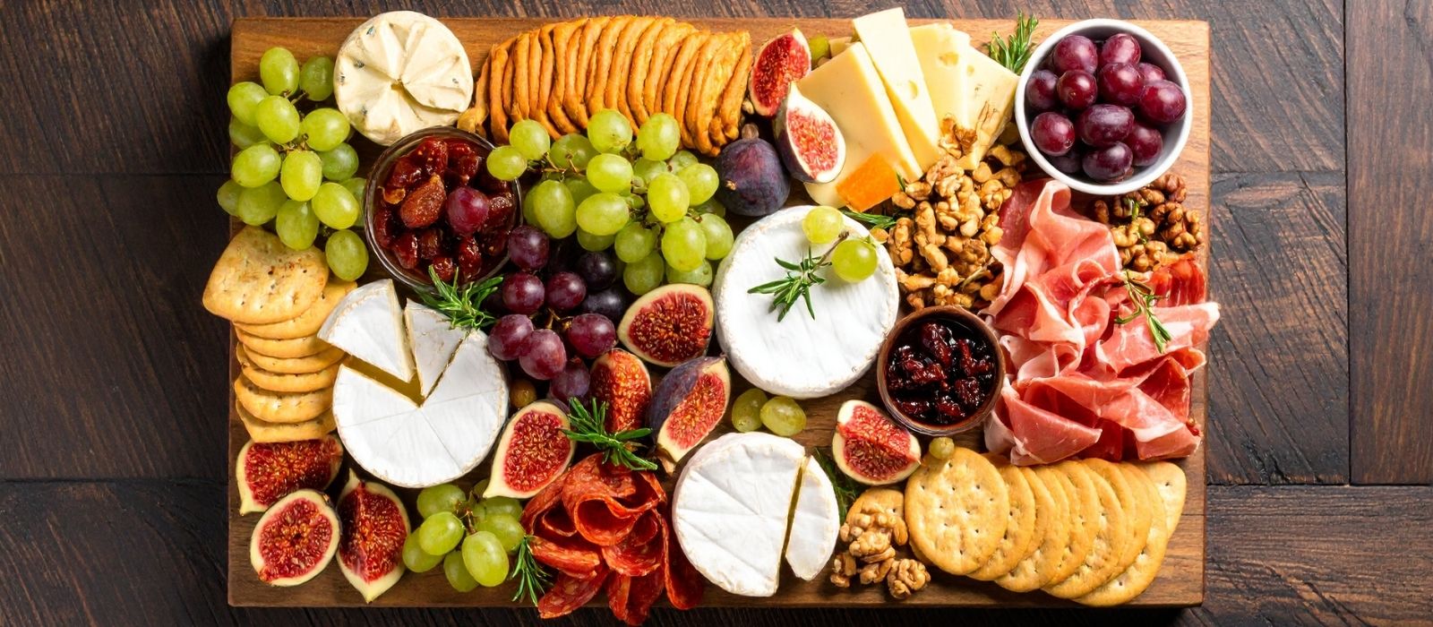 charcuterie board cheese fruits nuts