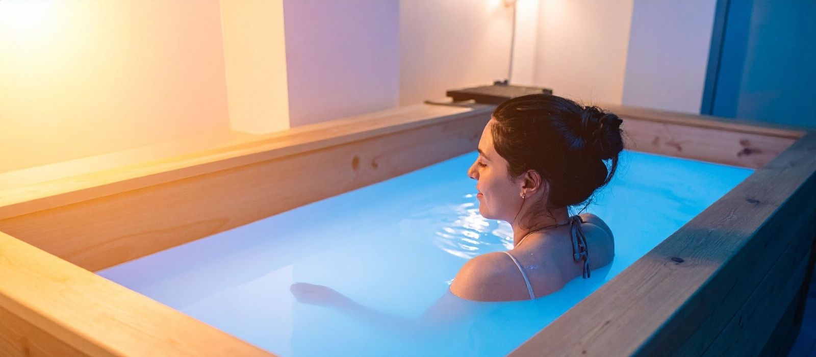 woman cold water wellness calm natural light