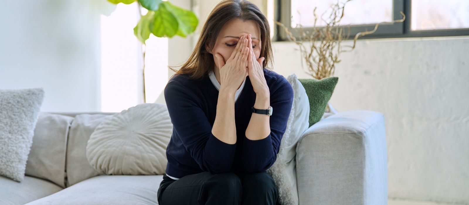woman stressed calm warm interior soft natural light