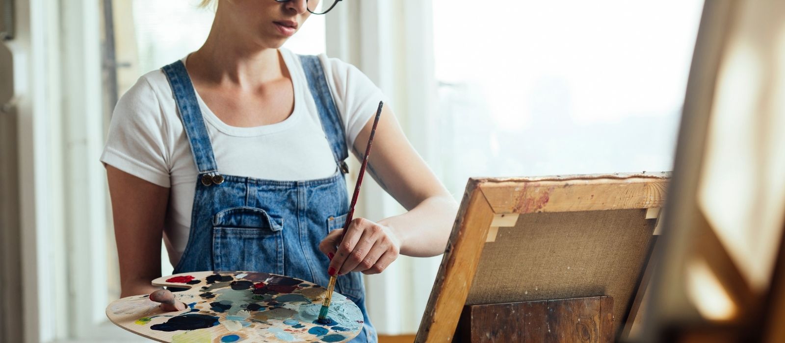 woman painting drawing creative hobby expression