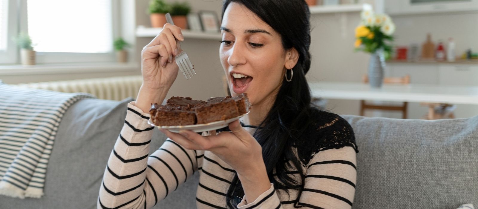 woman eating healthy meal vegetables