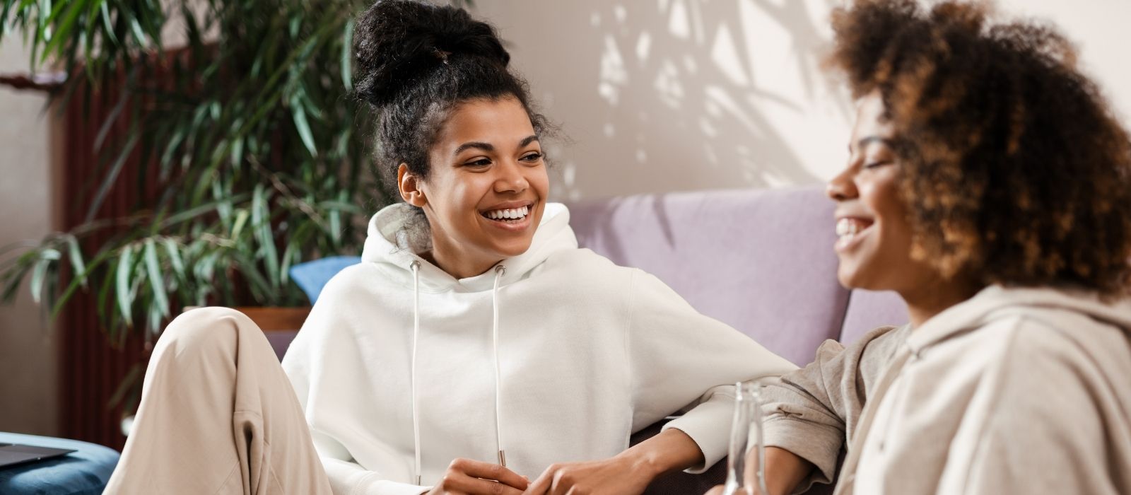 women friends warm light natural connection