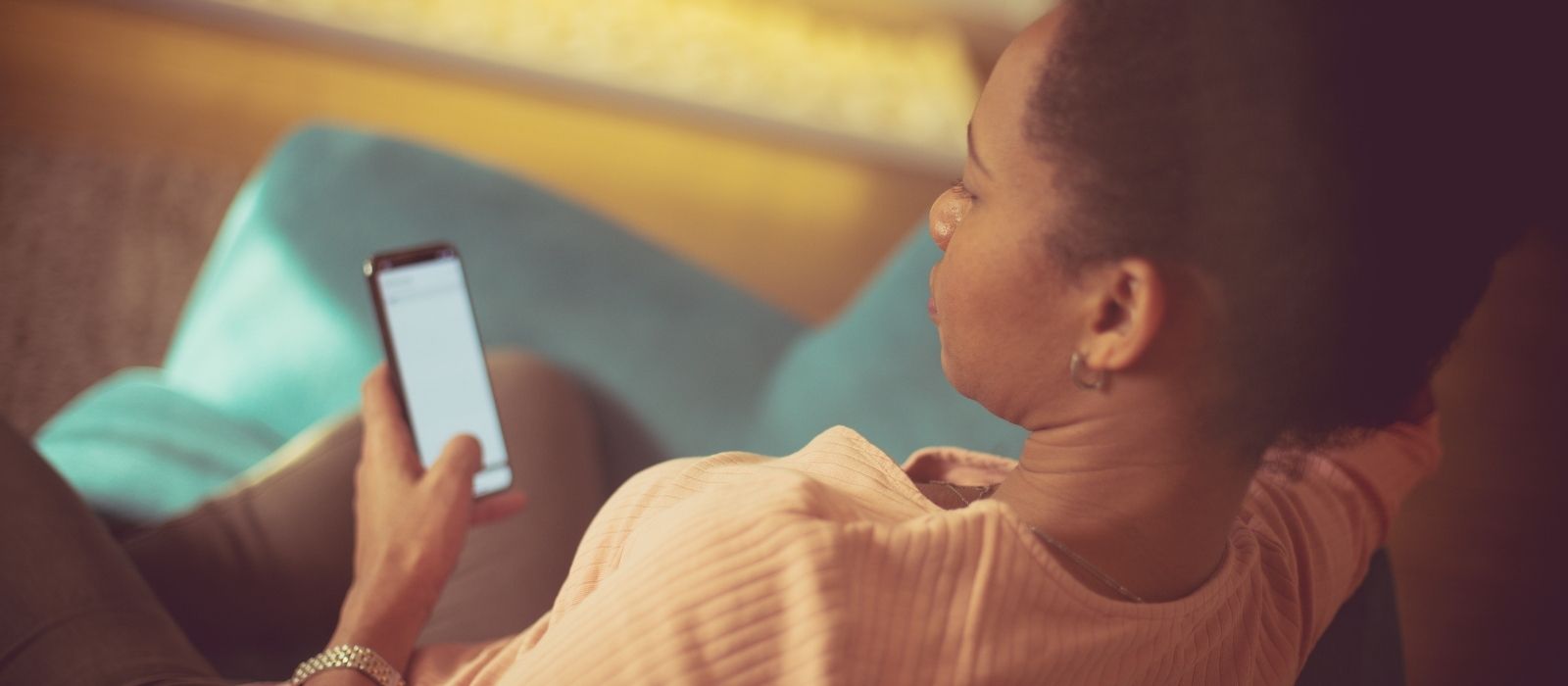 woman alone quiet interior warm natural light