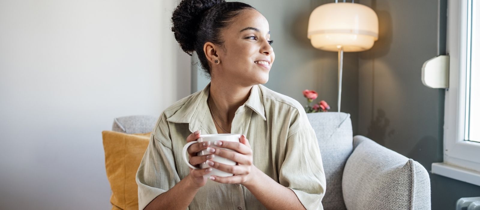 woman calm thoughtful morning warm soft light