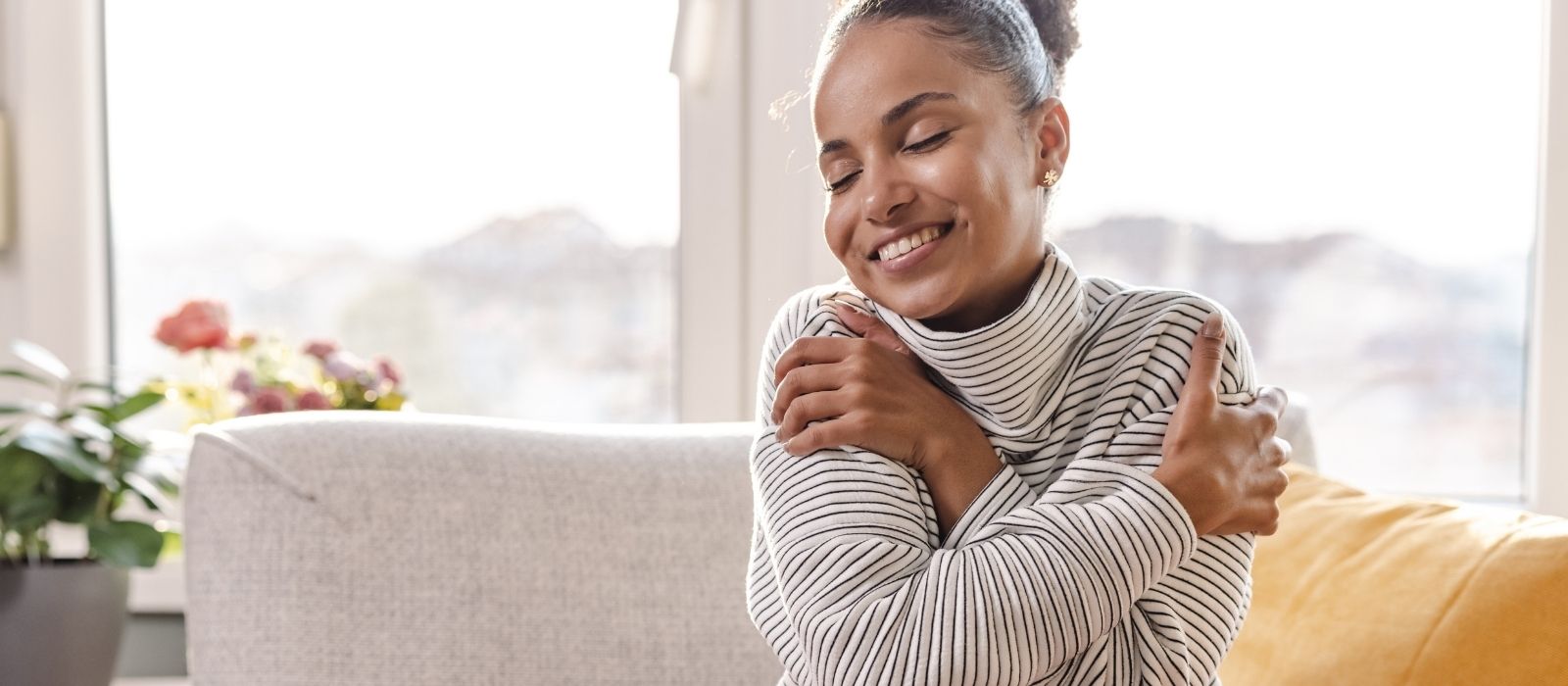 woman grounded calm warm natural light interior