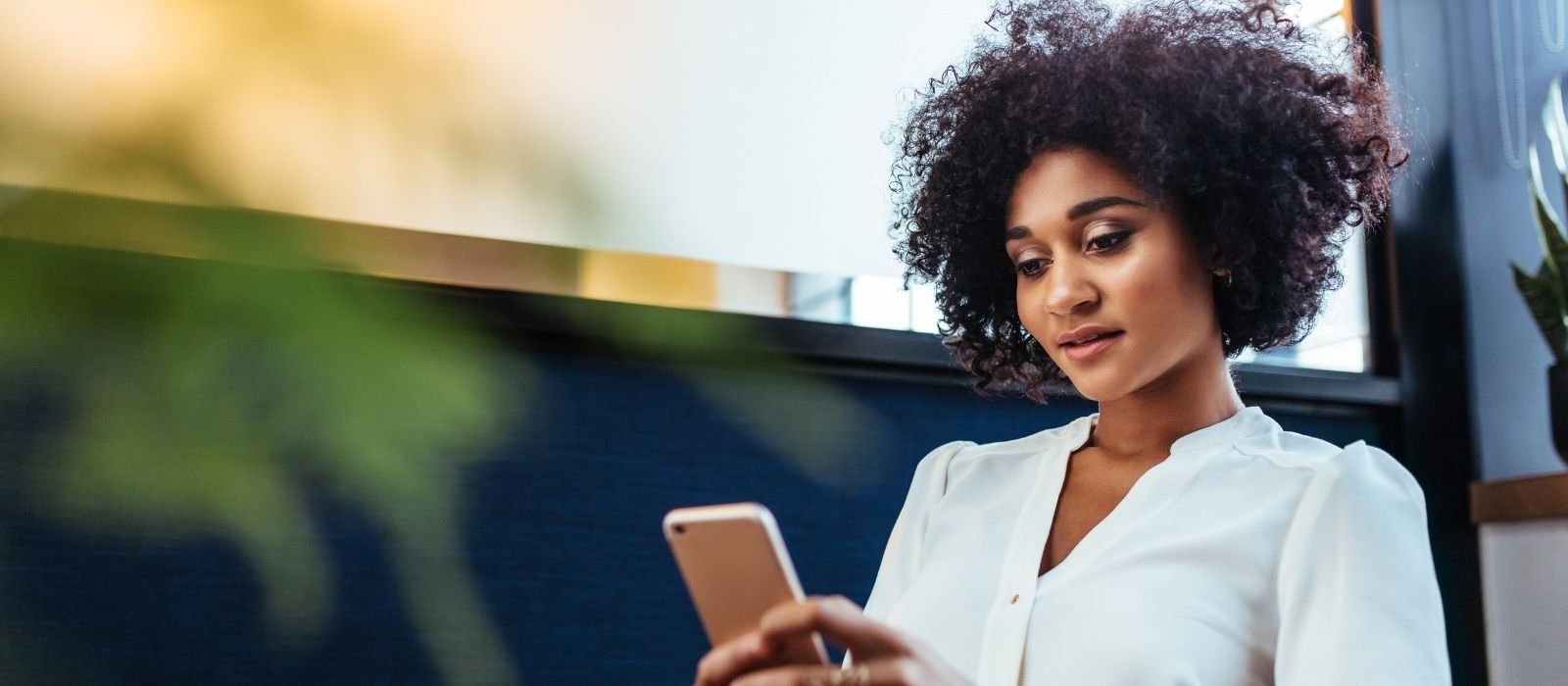 woman present calm warm interior natural light