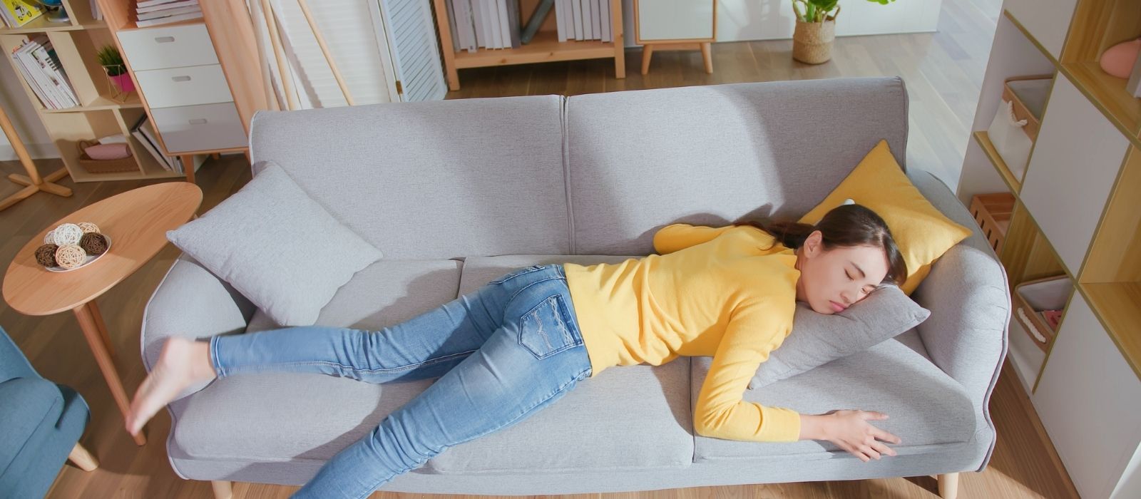 woman tired exhausted warm interior soft light