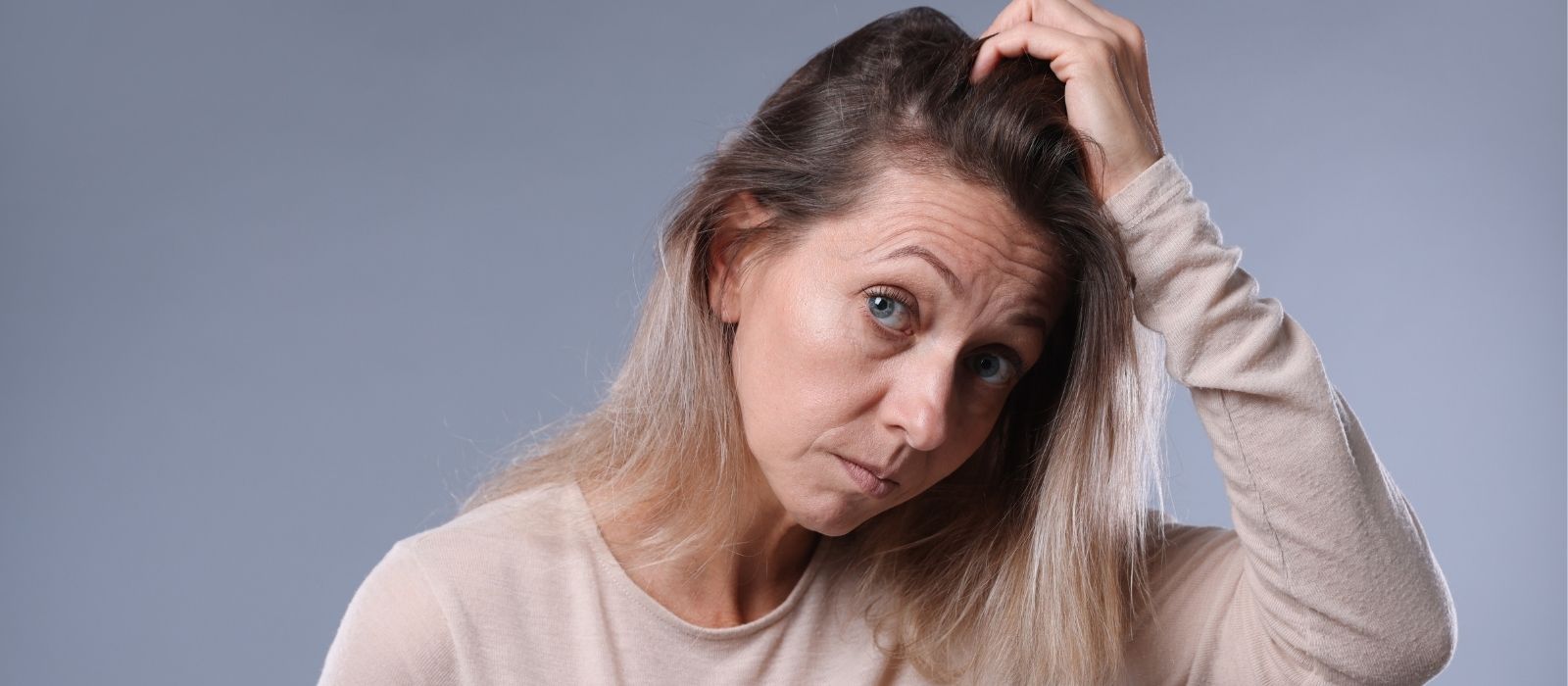 Why Your Scalp Is Oily but Your Ends Are Dry